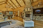 Living area with 65` TV and gas fireplace